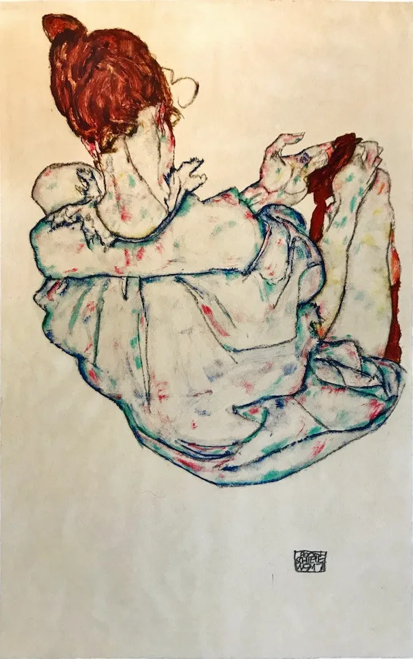 "Сидящая спиной девушка"